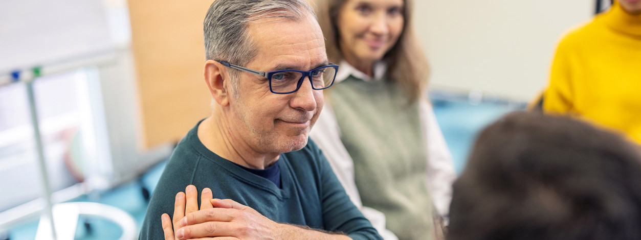 Zuhörer nehmen am Parkinson-Symposium teil