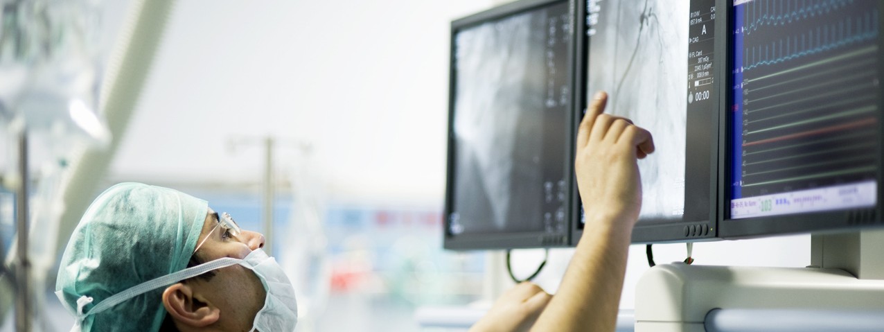 "Cardiologist doctors are in a angio operation, one of the doctors following the LCD screens for the stent... ( real life )"